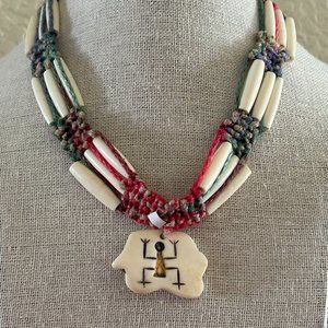 Hair Pipe Beads and woven fiber necklace, Aztec man symbol